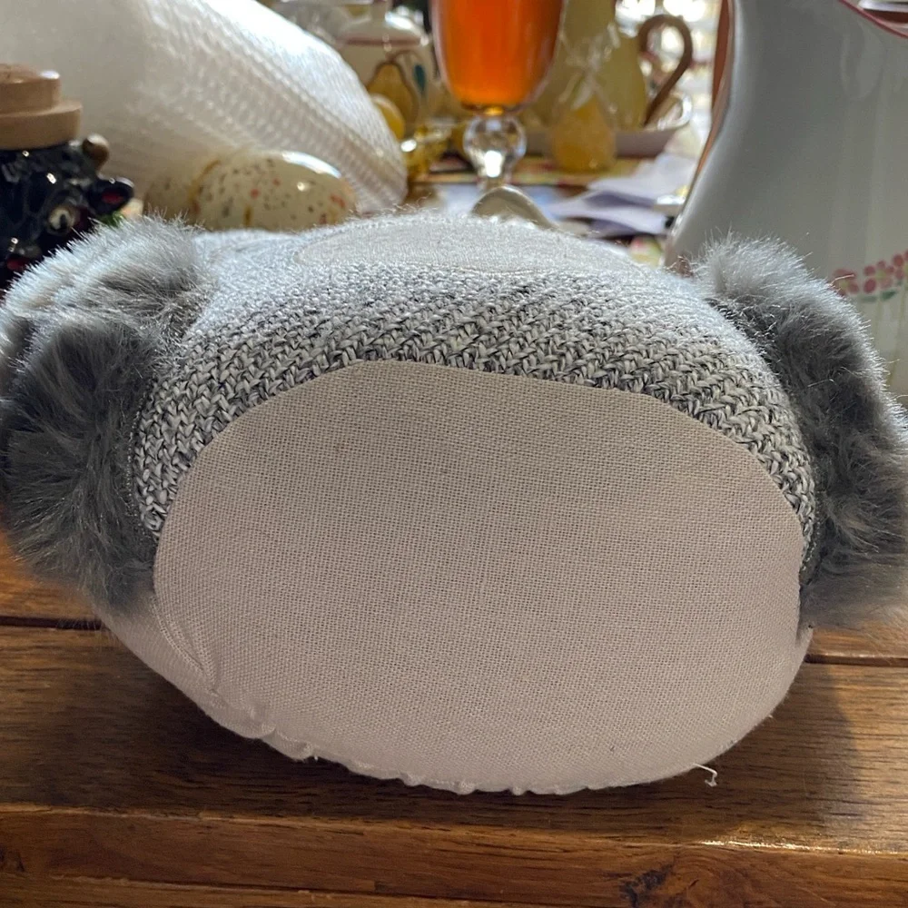 This is an Elements Weighted Fabric Owl Door Stopper. NWOT. 9 inches tall.